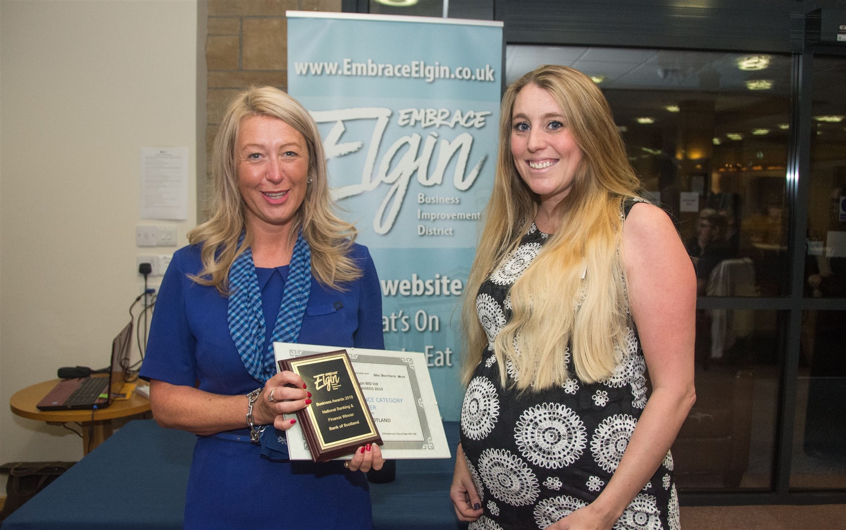 Abigail Dempster (right) presents the national banking award to Bank of Scotland.