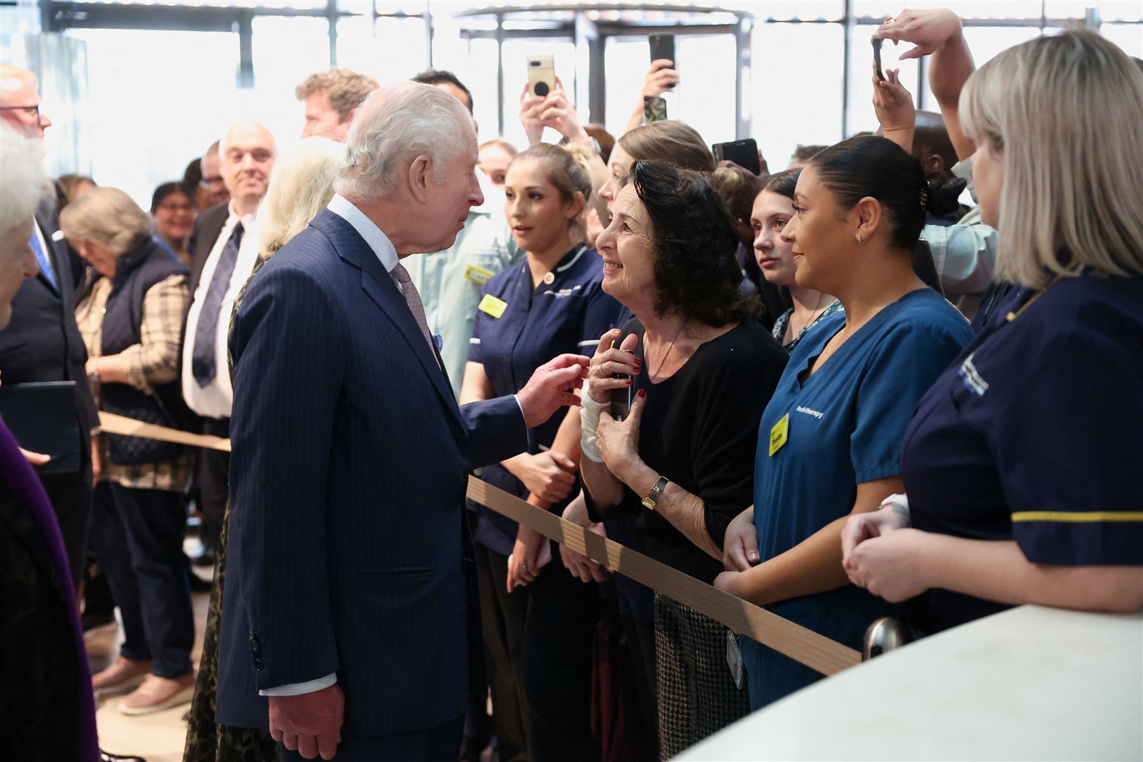 Charles meets staff members at the University College Hospital Macmillan Cancer Centre (Suzanne Plunkett/PA)