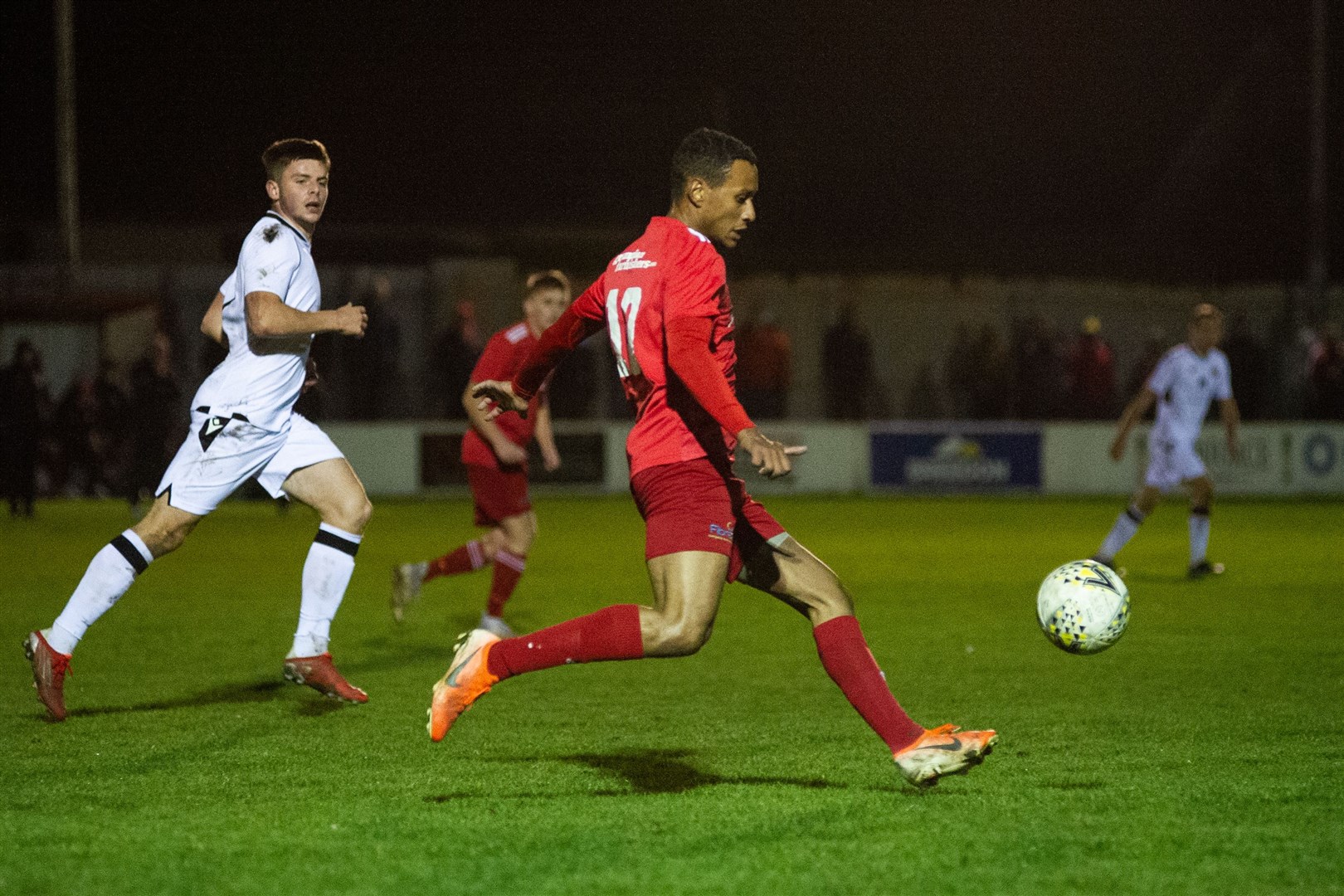 Lossiemouth's Fraser Forbes clears the ball up the park...Lossiemouth FC (0) vs Rothes FC (1) - Grant Park, Lossiemouth 03/11/2021 - Highland Football League...Picture: Daniel Forsyth..
