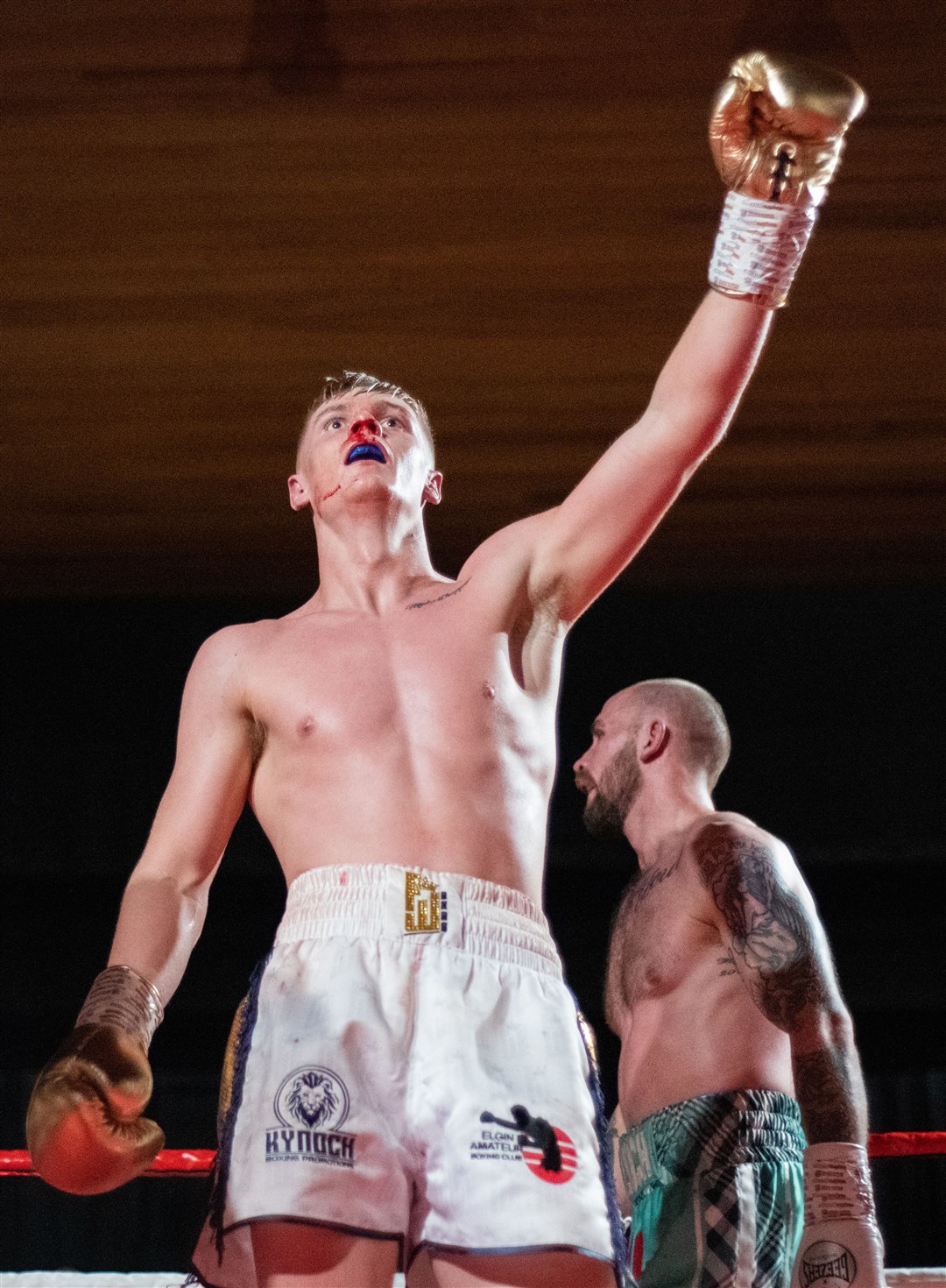 Bloodied but victorious. Fraser Wilkinson is the new champ. Picture: Daniel Forsyth..