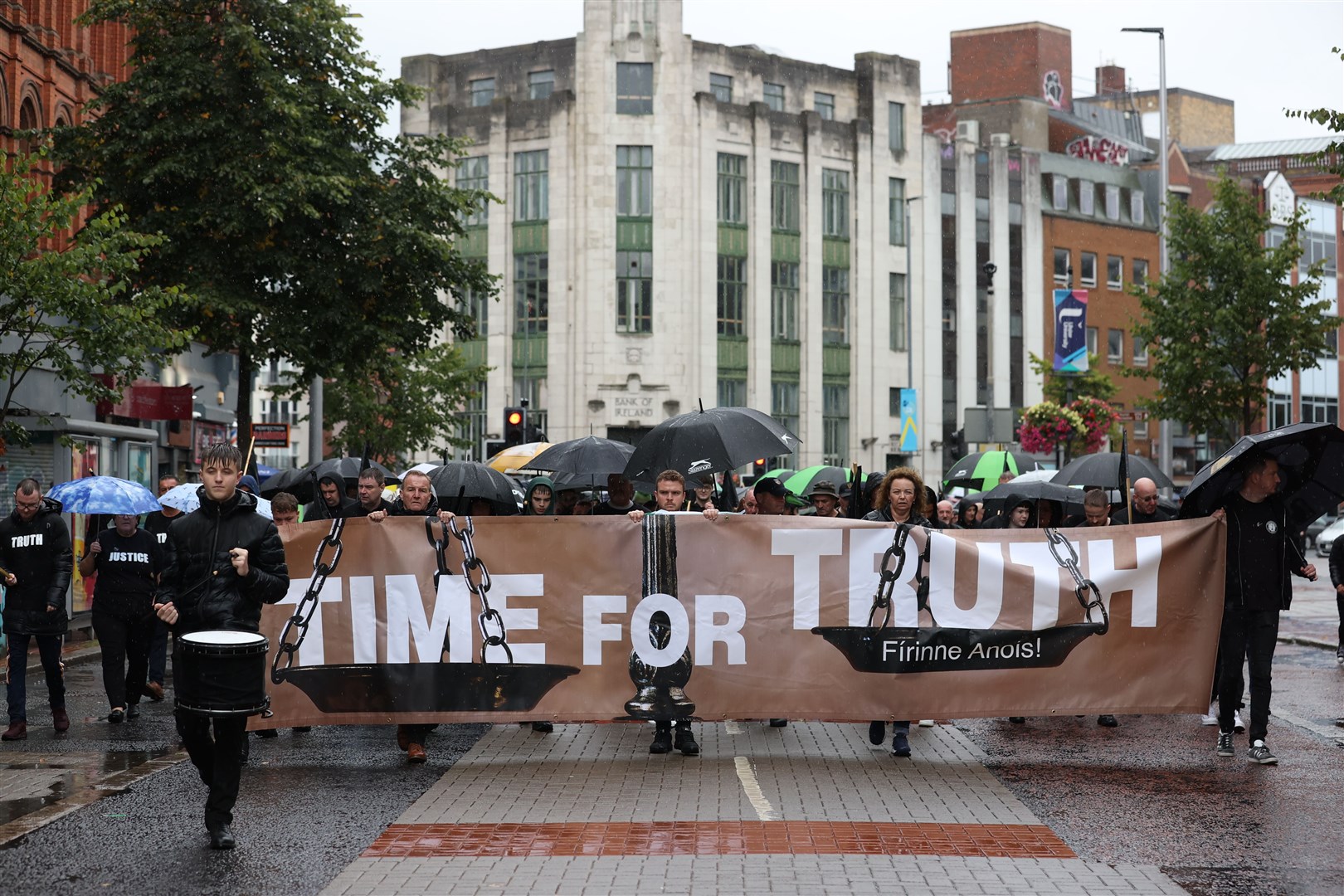 People march through Belfast city centre during the Time for Truth rally (Liam McBurney/PA)