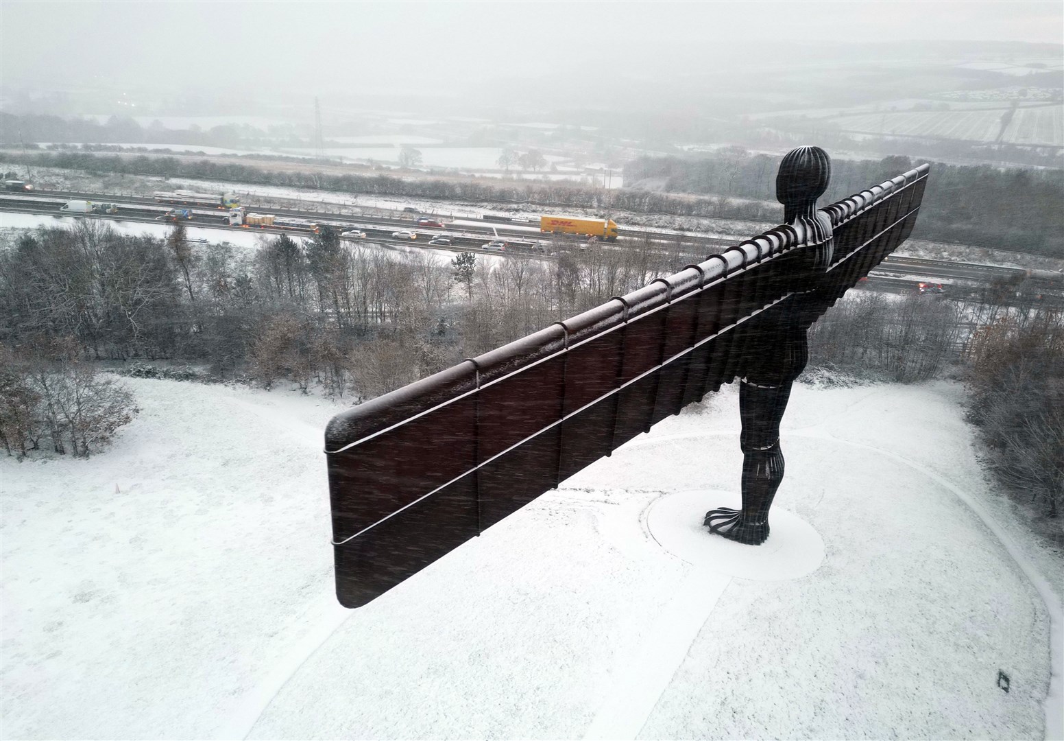The Angel of the North statue in Gateshead covered in snow (Owen Humphreys/PA).