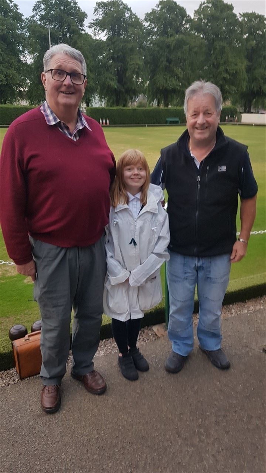 Young Forres bowler Caitlin Dustan (pictured with Derek Crosby and John Ross) is in the ladies championship quarter-finals.