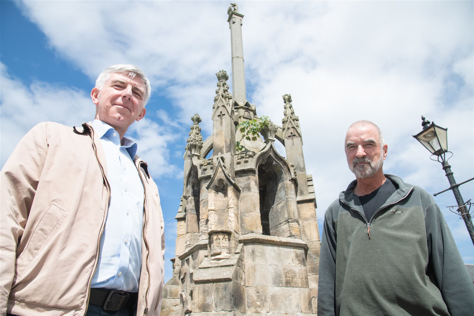 Councillor Donald Gatt (left) and CDCC secretary Bruce Edelsten at the Mercat Cross in Cullen's Millennium Square. Picture: Daniel Forsyth