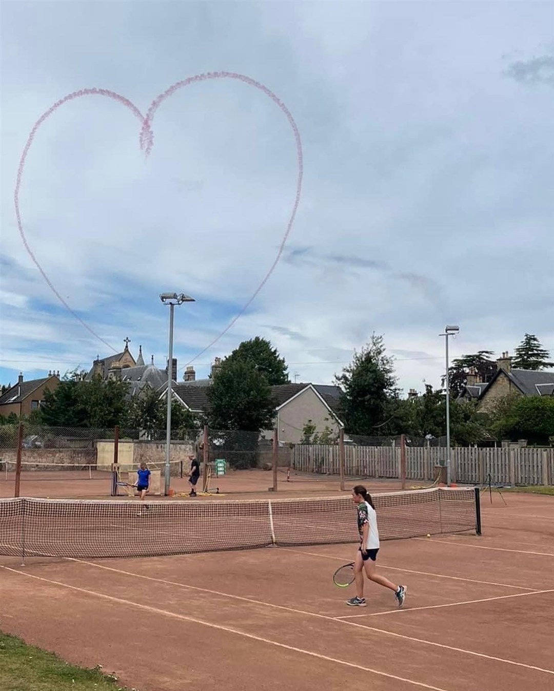 The Red Arrows formed a heart in the sky, which was captured during the North of Scotland Tennis Championships in Elgin.