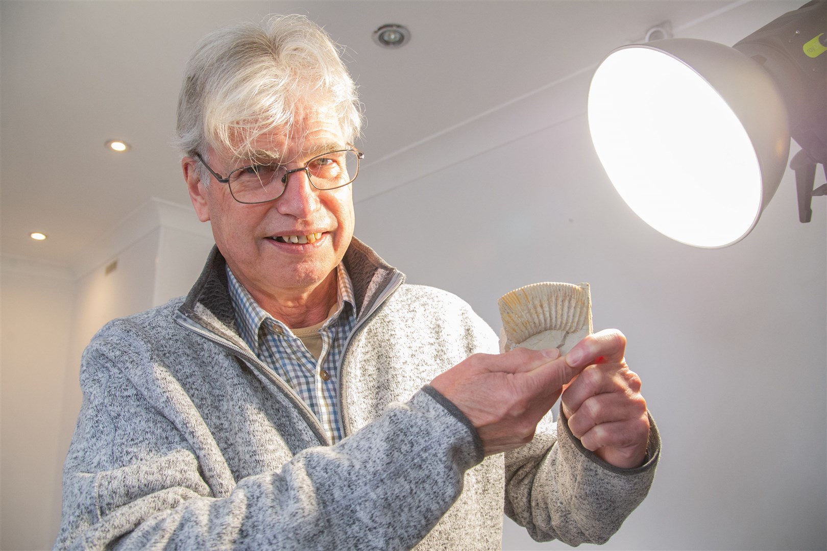 Palaeontologist Dr Nick Fraser holding a piece of ammonite from a Jurassic site in Germany at Elgin Museum's Fossil Finders Drop-in. Picture: Daniel Forsyth.