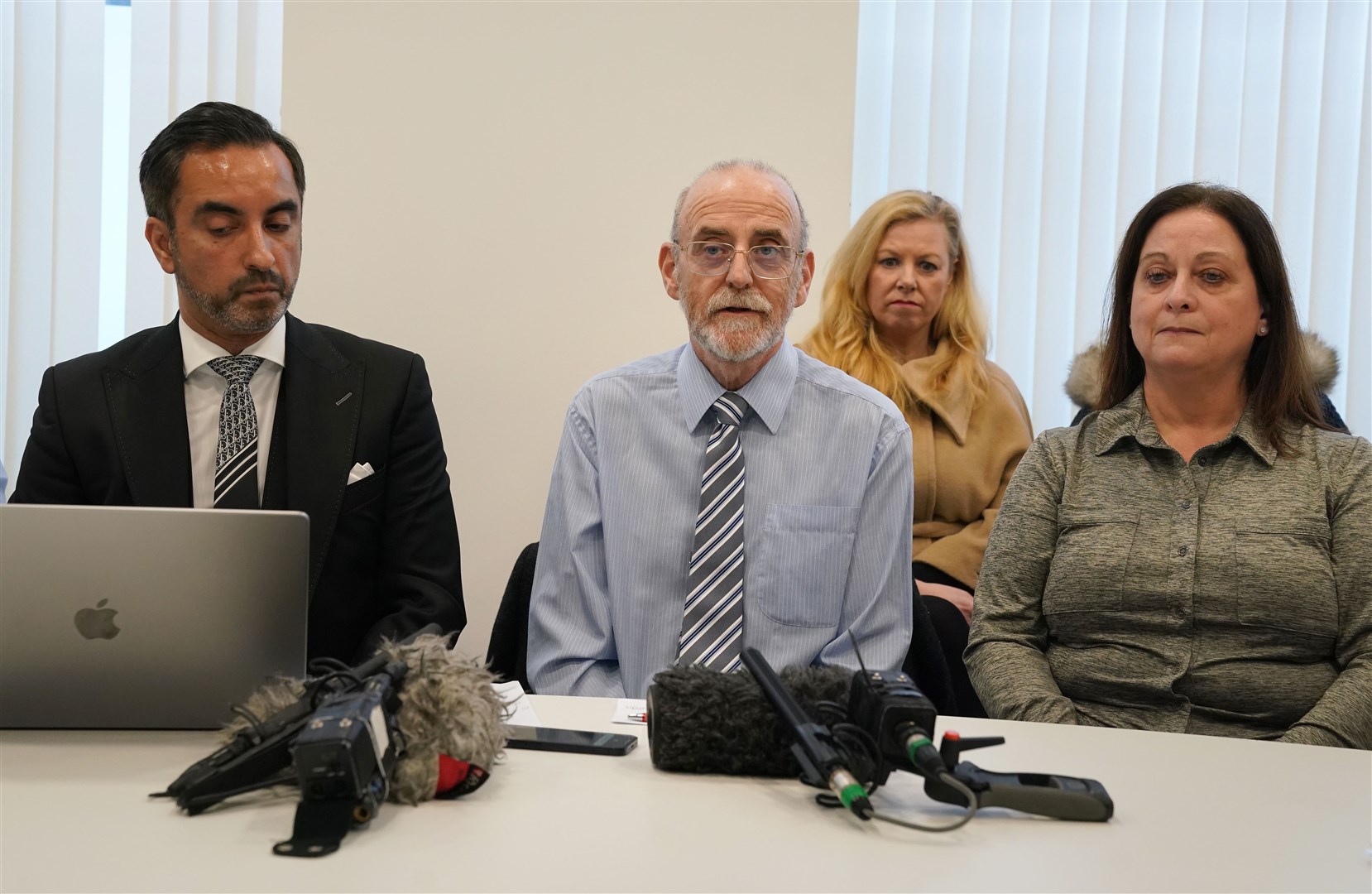Lawyer Aamer Anwar alongside Alan Wightman, centre, and Helen Lee Keenan, right, from the Scottish members of the Covid-19 Bereaved Families for Justice group (Andrew Milligan/PA)