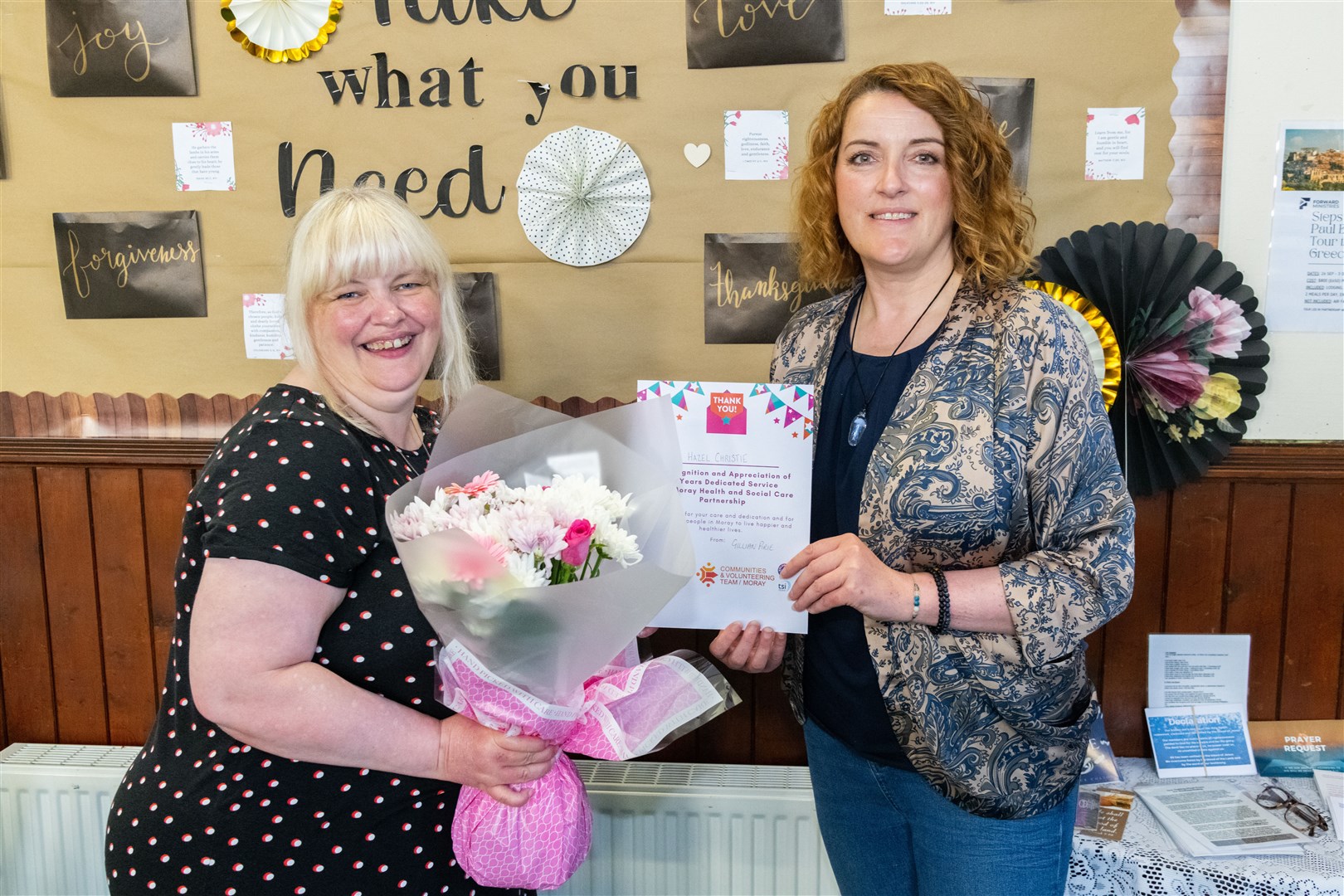 Gillian Pirie, Volunteer Development Officer with Hazel Christie (left) who has been recognised for her 20 years service with the Health and Social Care Partnership at the Moray Council Volunteering Event...Picture: Beth Taylor.