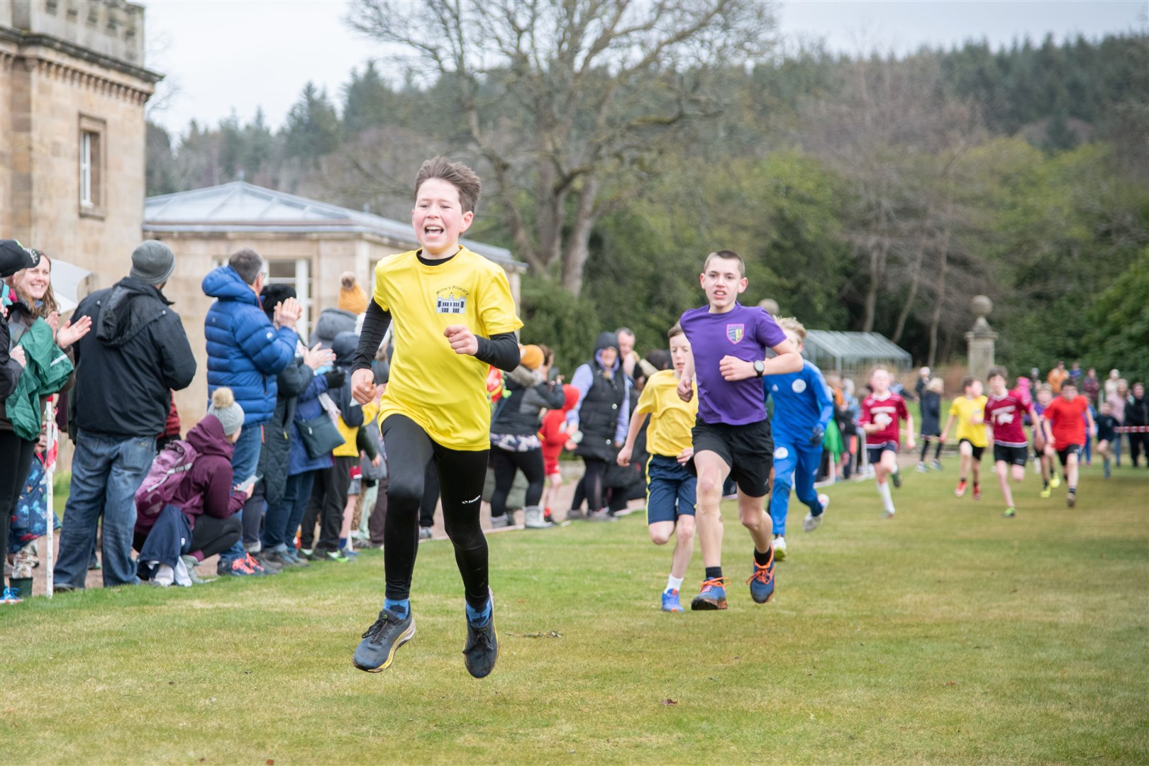 EL_PR Cross Country 2024 29Milnes' Marshall Smith (yellow tshirt) sprints home in 11th place in the P6/7 Boys race.Active Schools Primary Cross Country 2024, held at Gordon Castle, Fochabers. Picture: Daniel Forsyth.