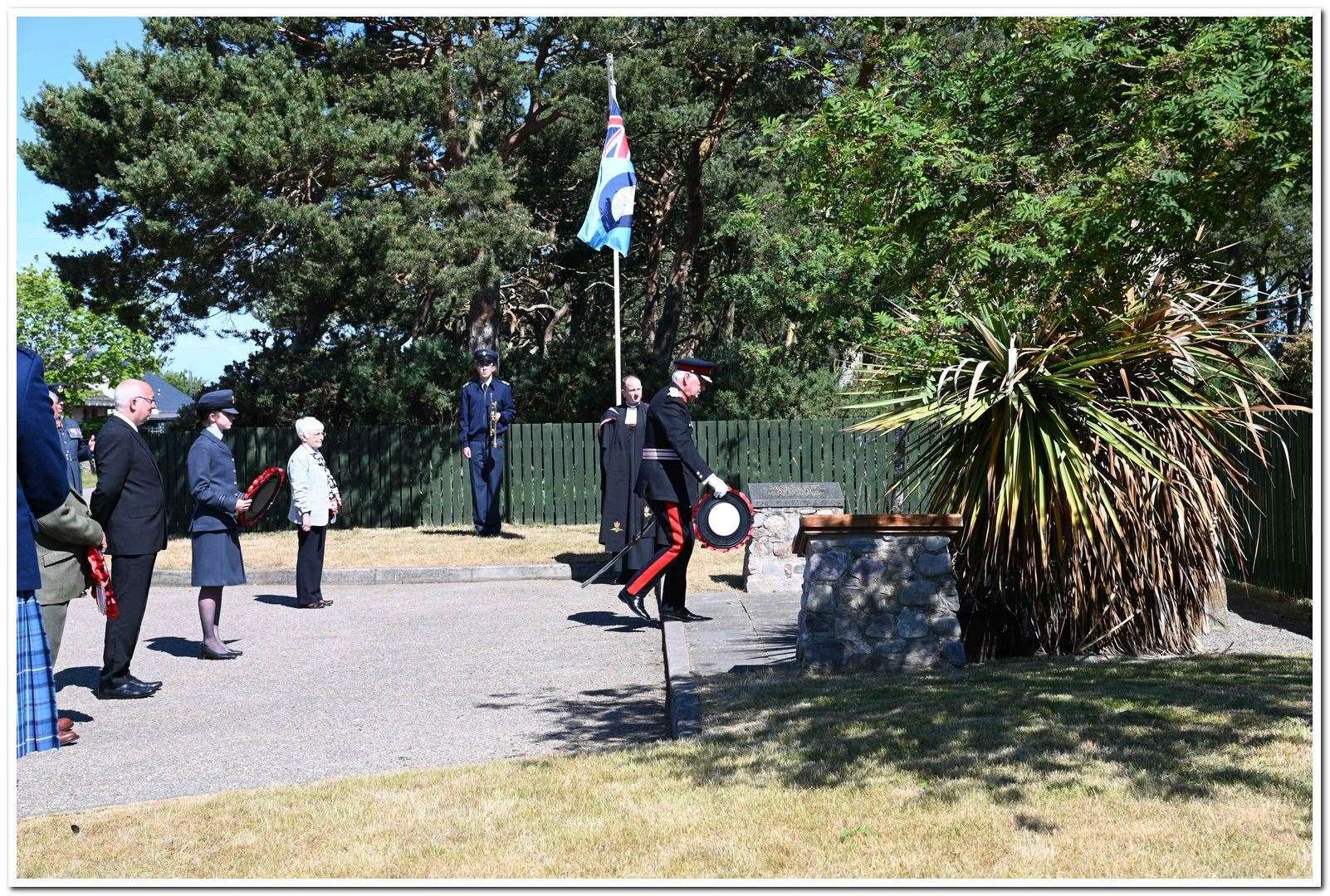 Lord Lieutenant of Moray, Seymour Monro, places a wreath at the war memorial.
