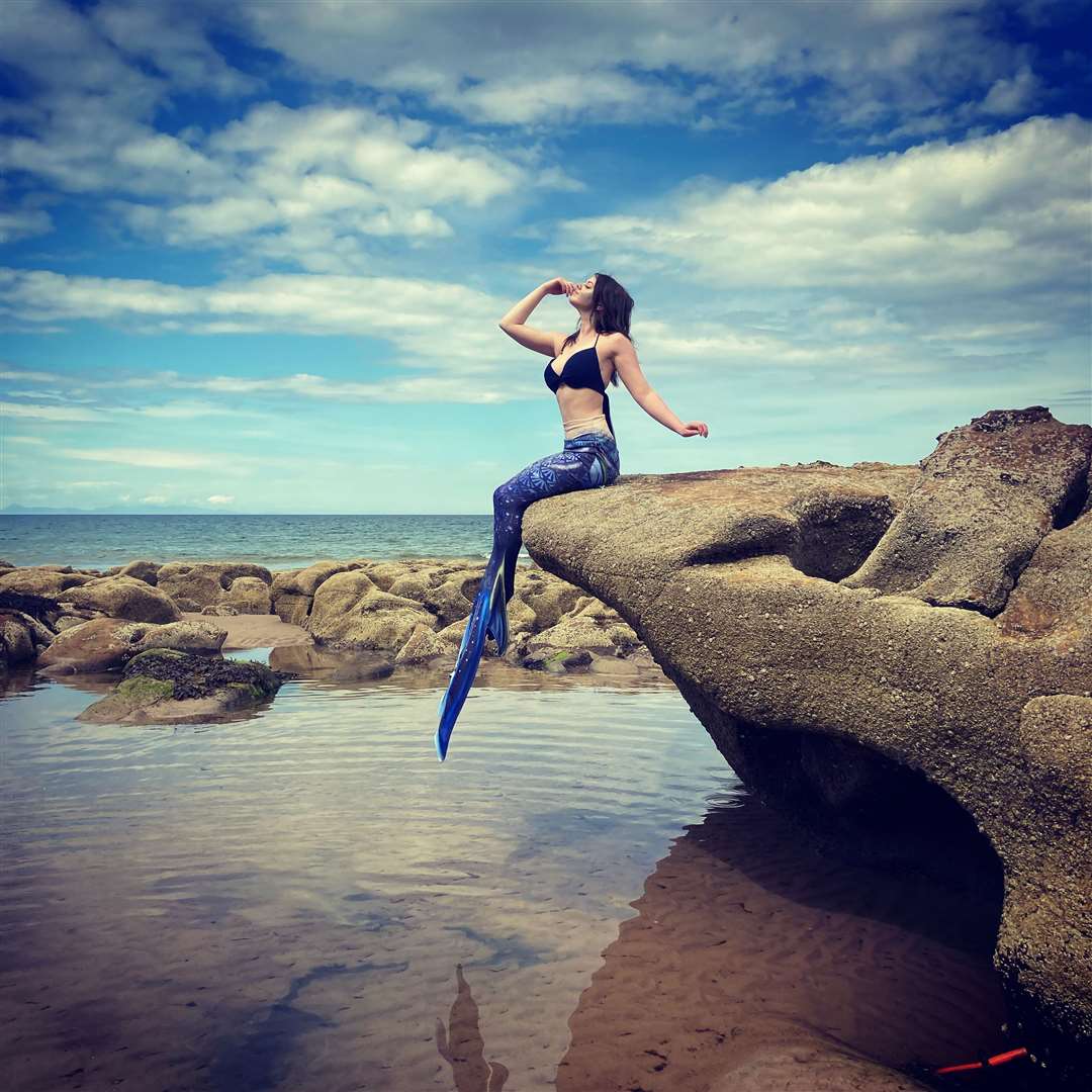 Ashleigh in full mermaid pose on Scaley Rock.