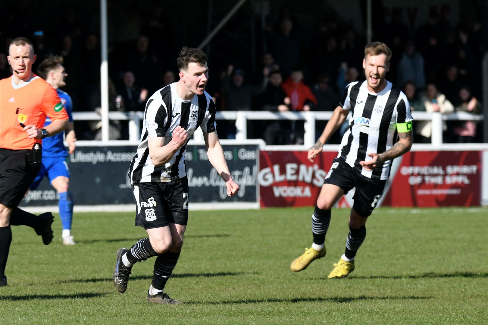 Ryan MacLeman wheels away to celebrate as he gives Elgin City the lead on the hour mark. Picture: Daniel Forsyth