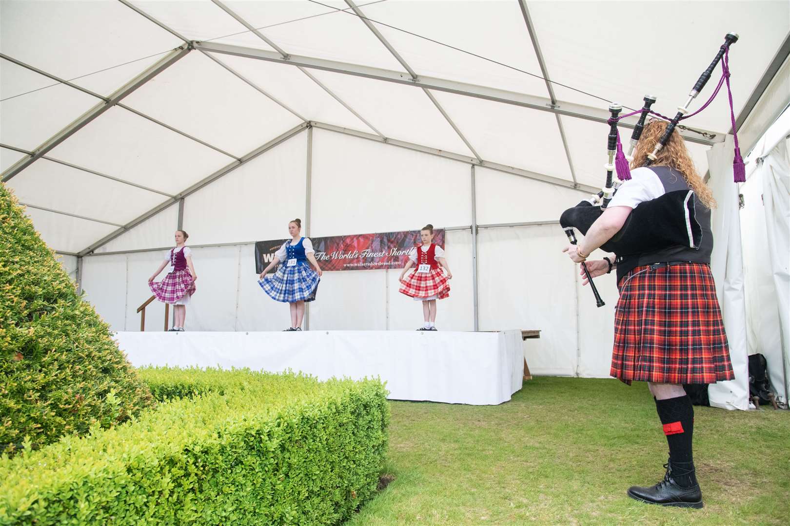 Piper Fiona Caldwell plays for some Highland Dancers. Picture: Daniel Forsyth