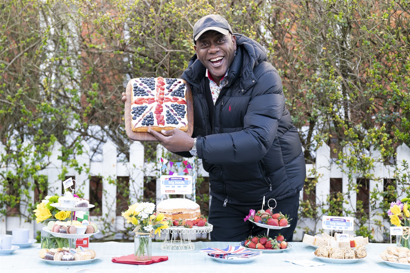 Celebrity TV chef Ainsley Harriott joins Coronation Big Lunch organisers in East Sheen, south-west London (Kirsty O’Connor/PA)