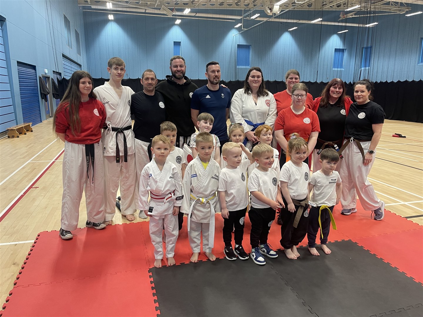 Martin Stamper (centre, in blue) visited Sansum Martial Arts at Moray Sports Centre.
