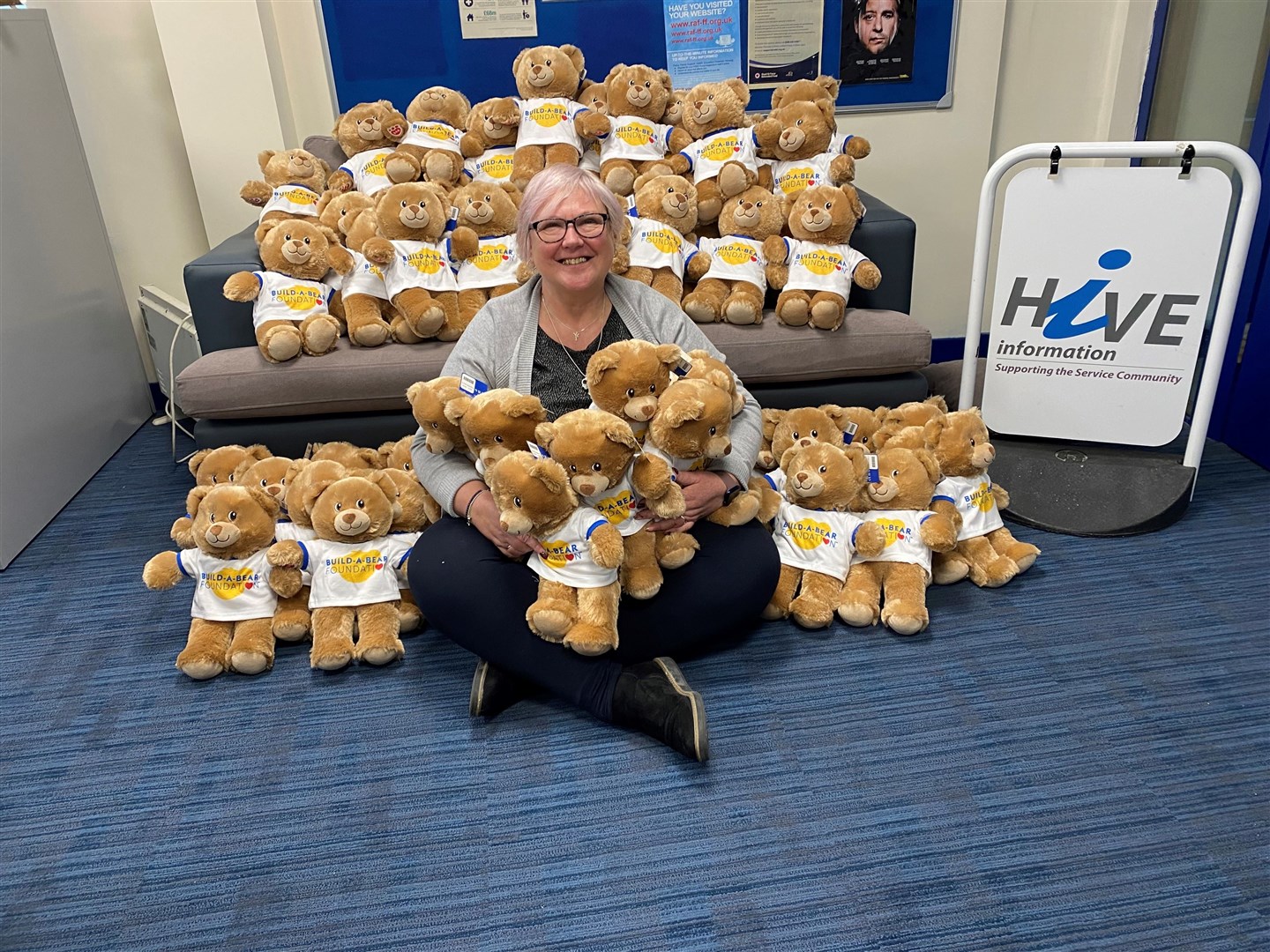 Debbie Tulip, HIVE Information Officer at RAF Lossiemouth, with the teddy bears.