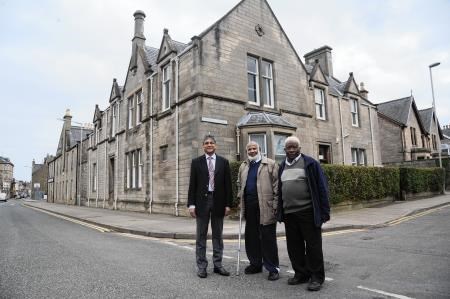 Welcoming the granting of planning permission for a mosque at the former council offices on Elgin's South Street are (from left) Liaqat Ali, Nemit Ali and Lansara Bangura.