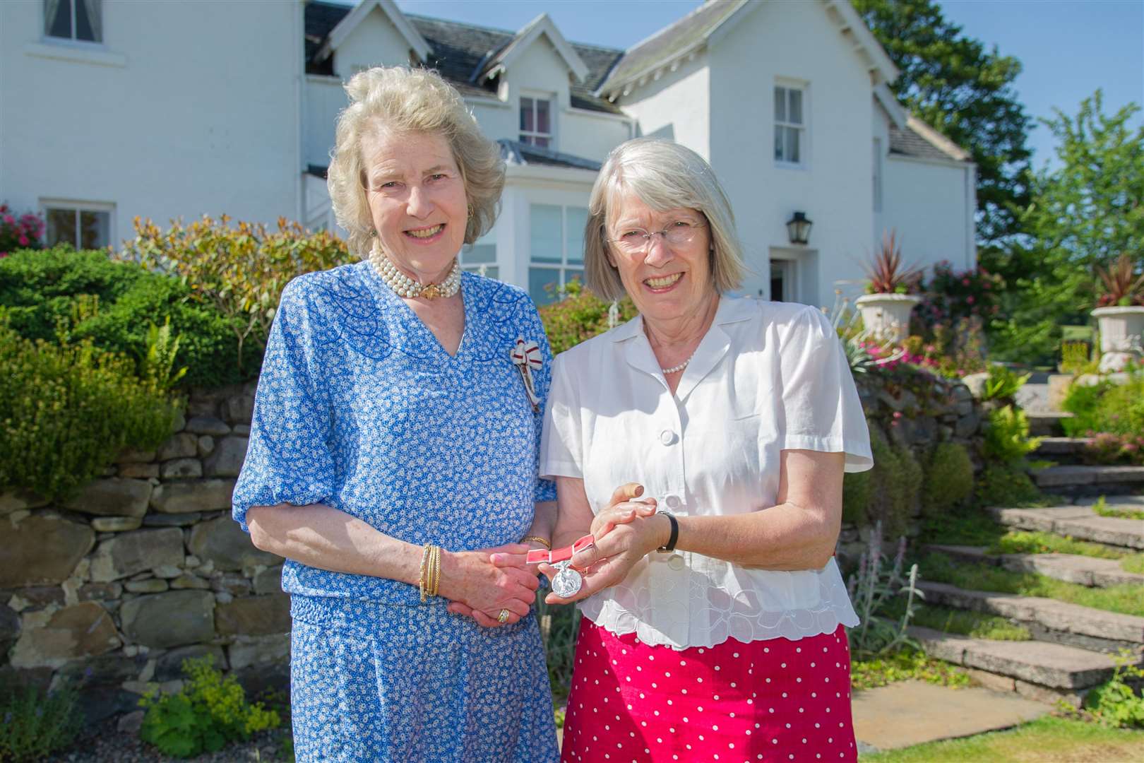 The Lord Lieutenant of Banffshire Clare Russell (left) presents Aberlour's Susan Anderson with a British Empire Medal. Picture: Daniel Forsyth. Image No.044329.