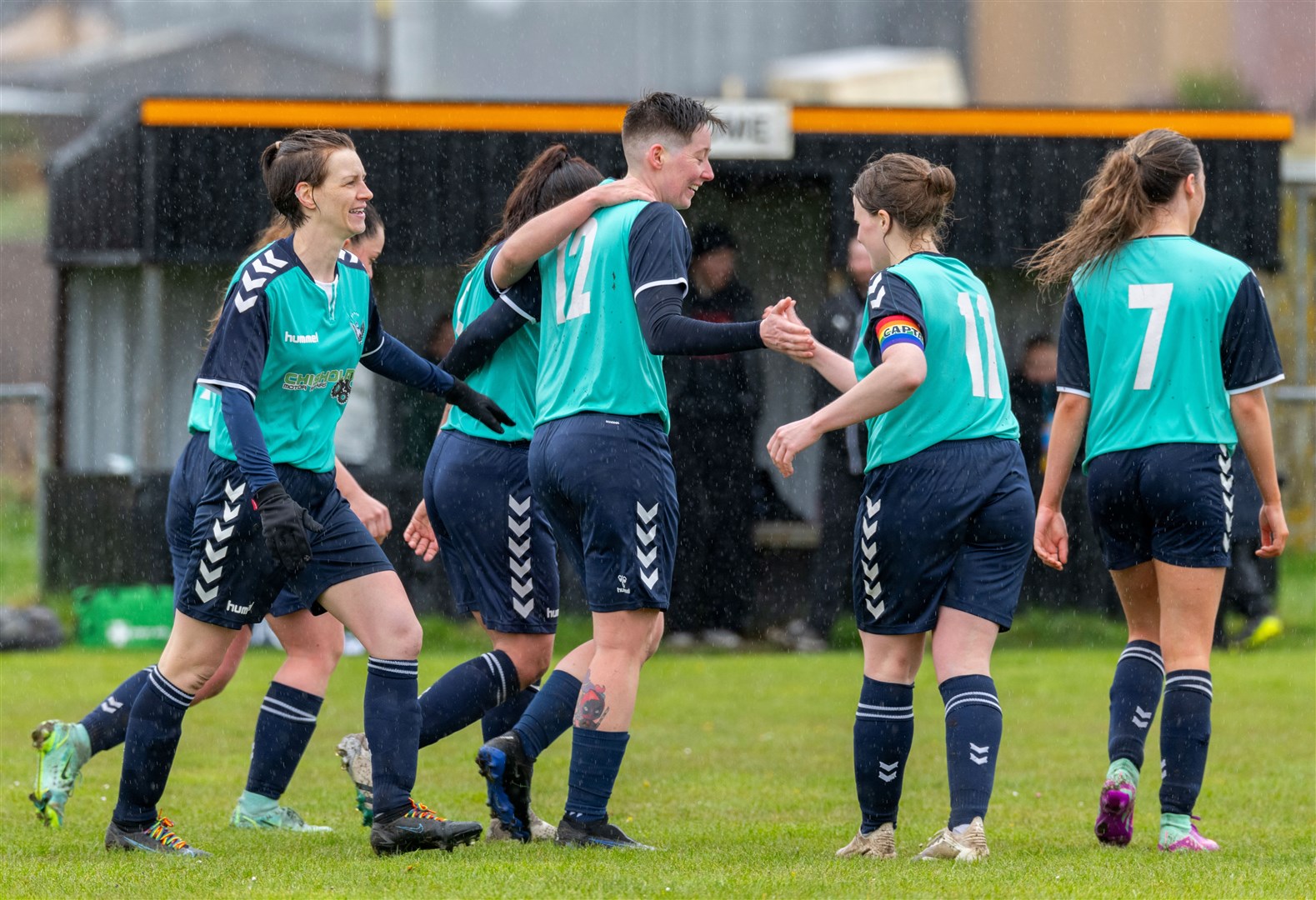 Buckie Ladies celebrate with scorer Jess Moore. Picture: Beth Taylor