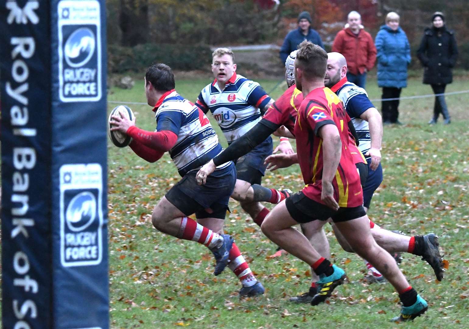 Cameron Hughes looks to offload to Lewis Scott to score. Picture: James Officer