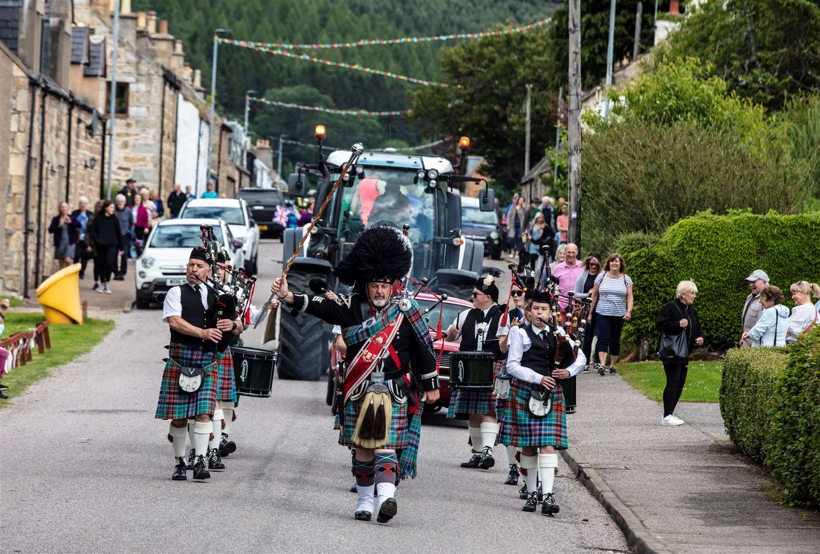 Strathisla Pipe Band led the parade from the Dallas Town Hall to the playing fields. Picture: Nick Gibbons