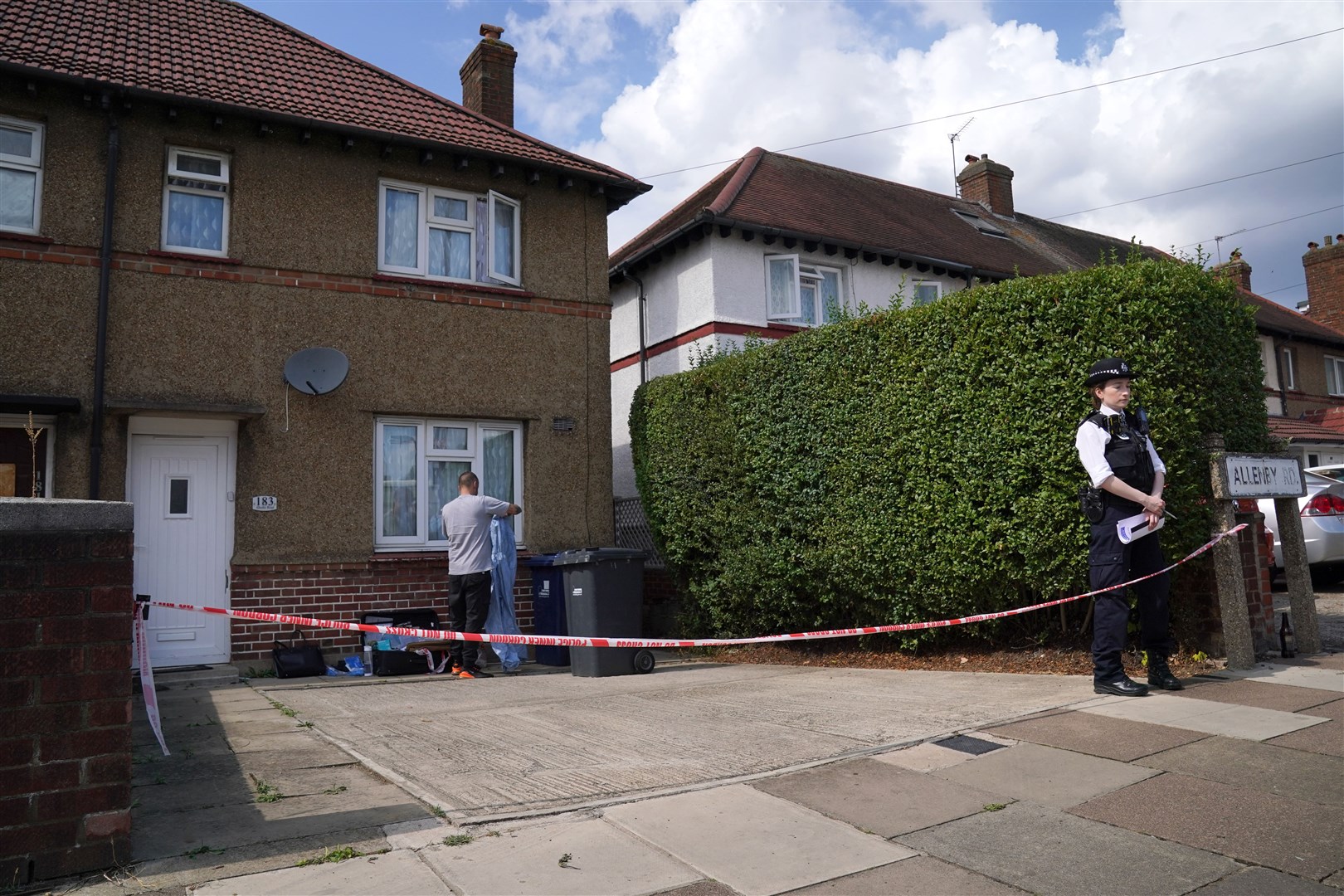 Police and forensic officers at a property in Southall, west London (Jonathan Brady/PA)