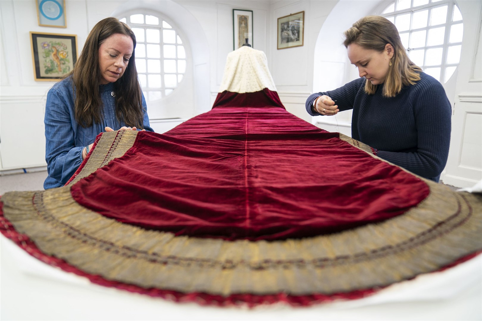 Conservation work on the King’s Robe of State (Kirsty O’Connor/PA)