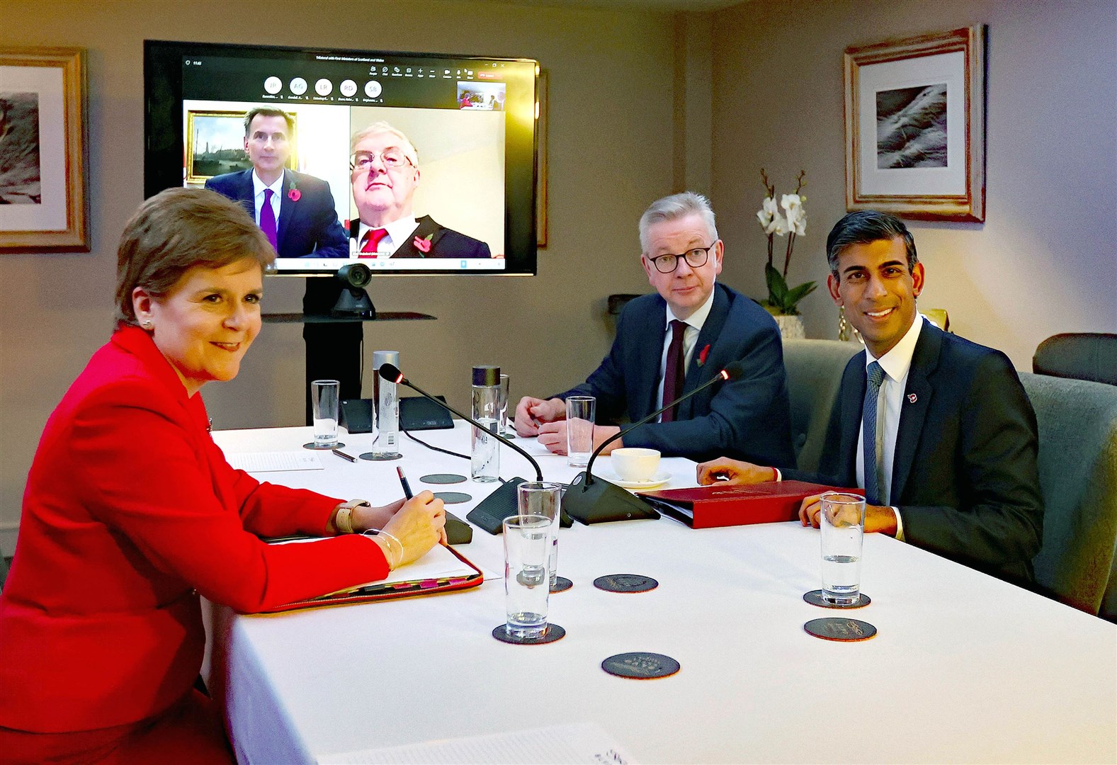 Rishi Sunak and Nicola Sturgeon with Michael Gove at the British-Irish Council Summit in November (PA)