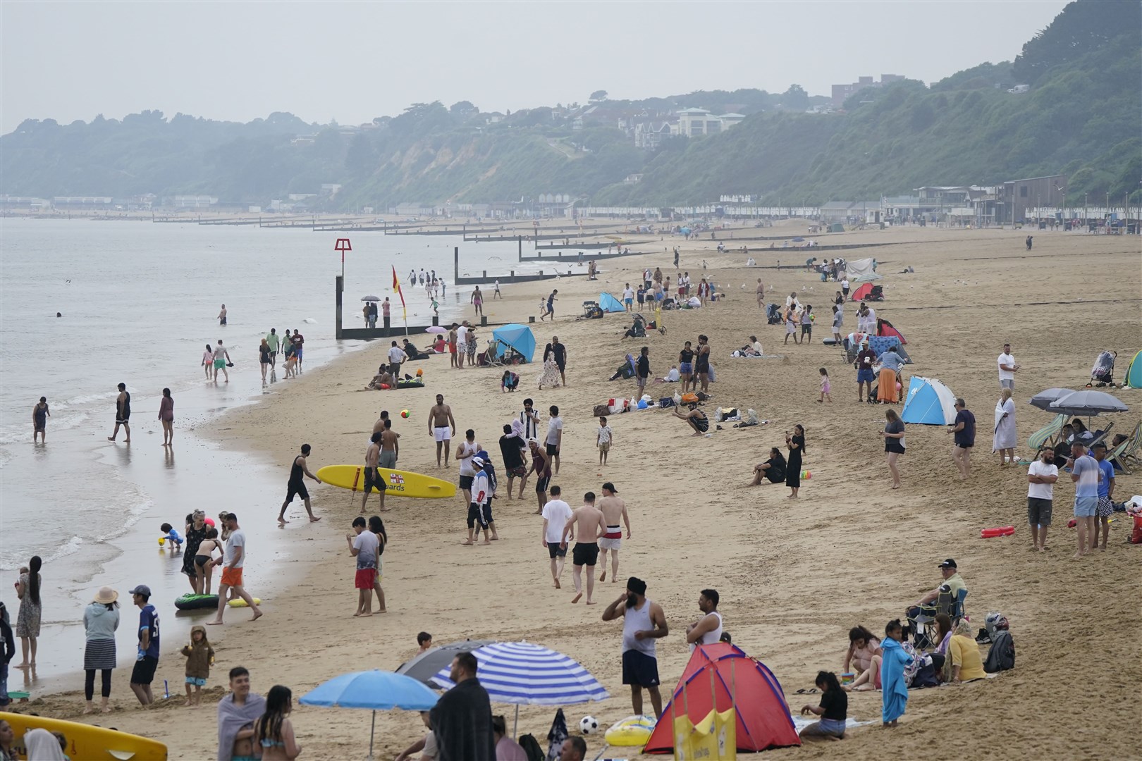 Beachgoers at Bournemouth in Dorset (Andrew Matthews/PA)