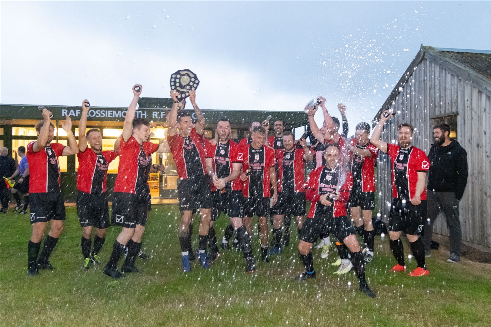 Fochabers celebrate after securing the League title. Picture: Beth Taylor.