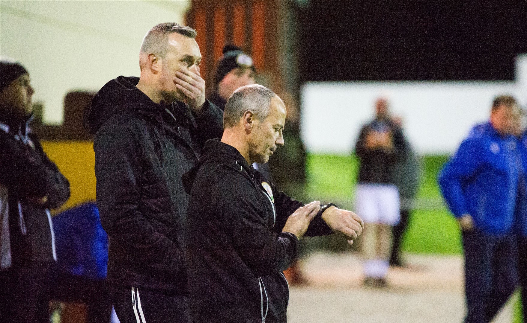 Gordon Connelly checks his watch as half-time approaches, with a shocked Steven Macdonald looking on. Picture: Becky Saunderson