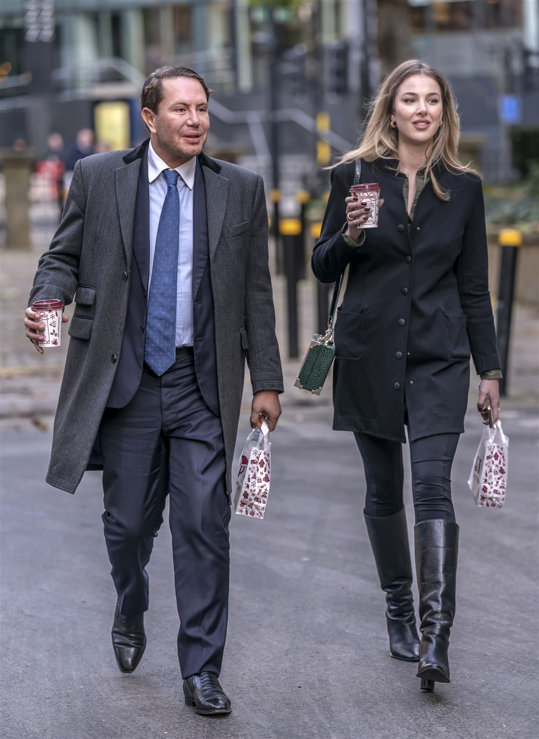 Socialite James Stunt and Helena Robinson outside Leeds Cloth Hall Court during a break for lunch (Danny Lawson/PA)