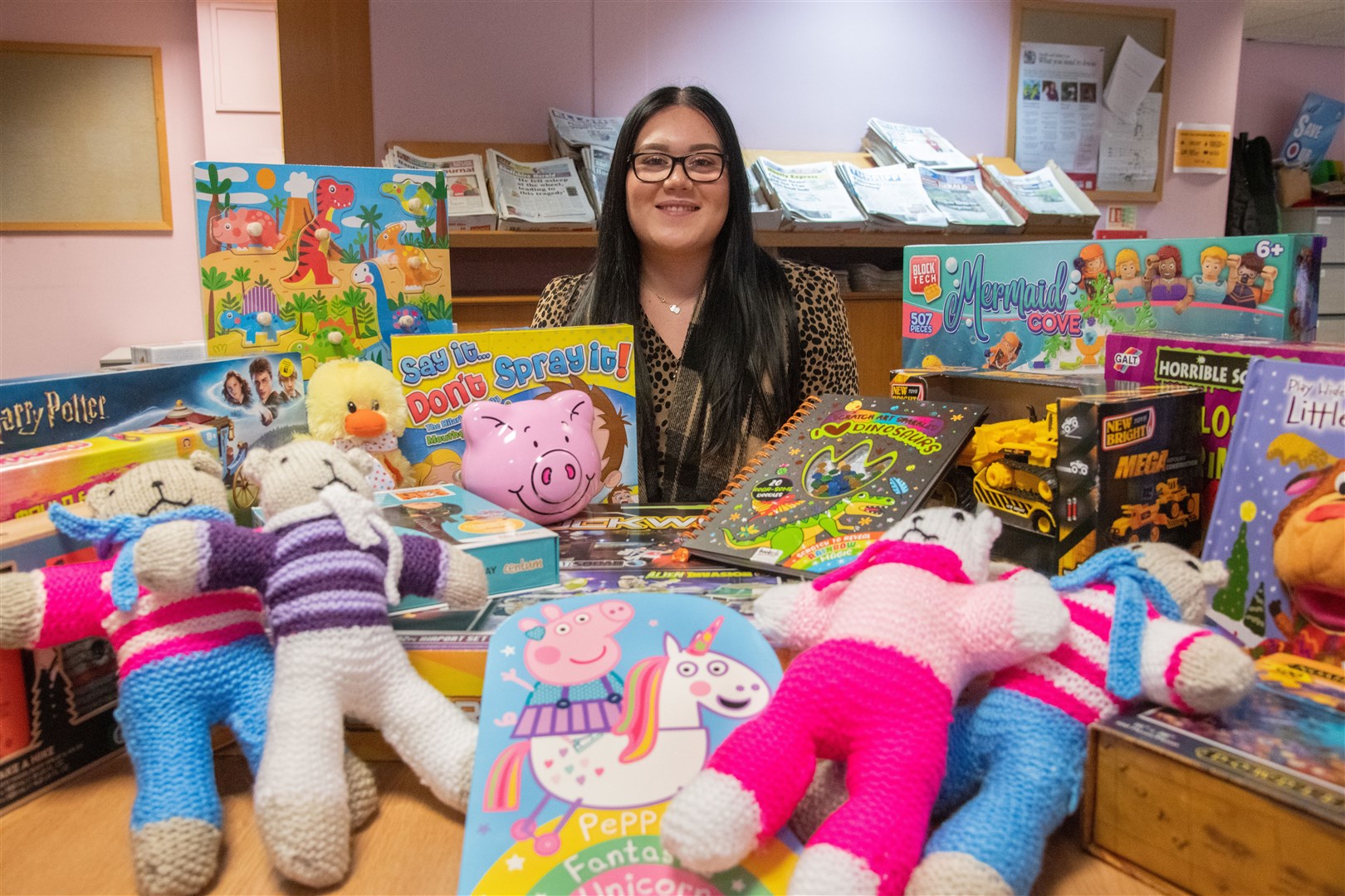 Chloe O'Connor of the Northern Scot with an array of toys and gifts that have been donated to the 'Scot's toy appeal. Picture: Daniel Forsyth
