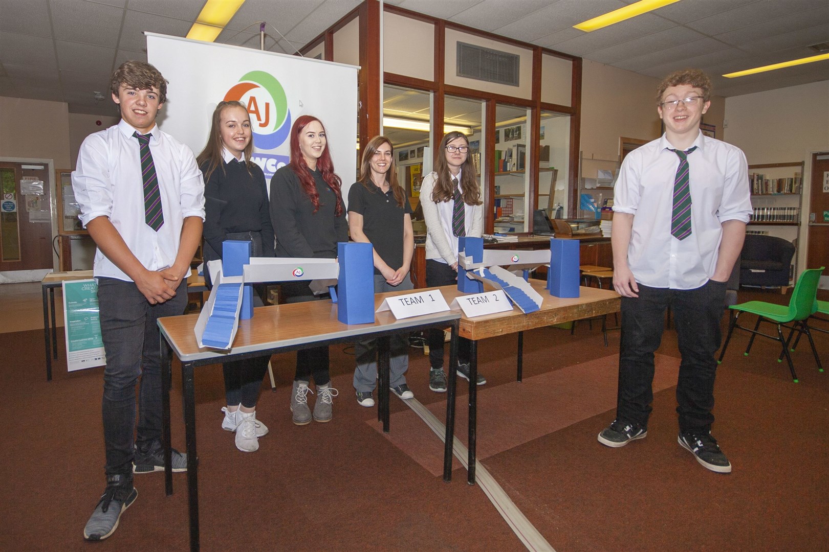 AJ Engineering, sponsor of the secondary school teacher award, regularly supports school projects. In this previous project AJ Engineering worked with pupils from Forres Academy. Pictured (centre) are former graduate apprentice Laura Mair and quality manager Jazmin Kellas.