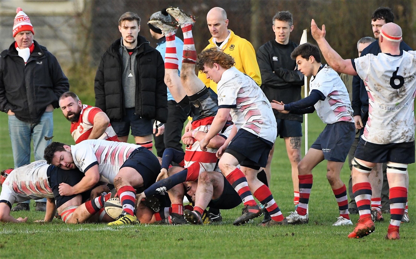Calum Archibald unceremoniously removed from ruck. Photo: James Officer