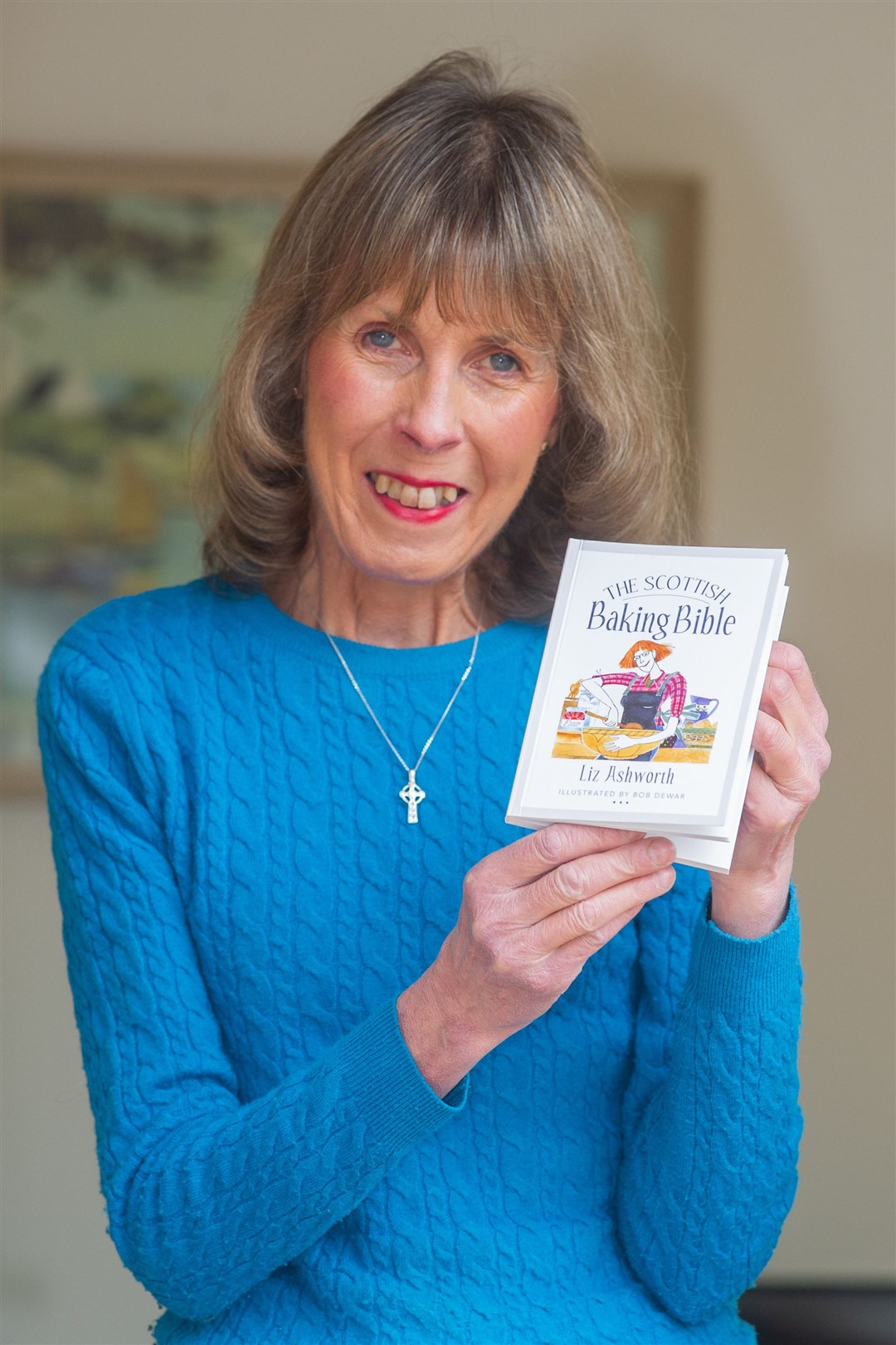 Liz Ashworth with a copy of her most recently published book - The Scottish Baking Bible. Picture: Daniel Forsyth..