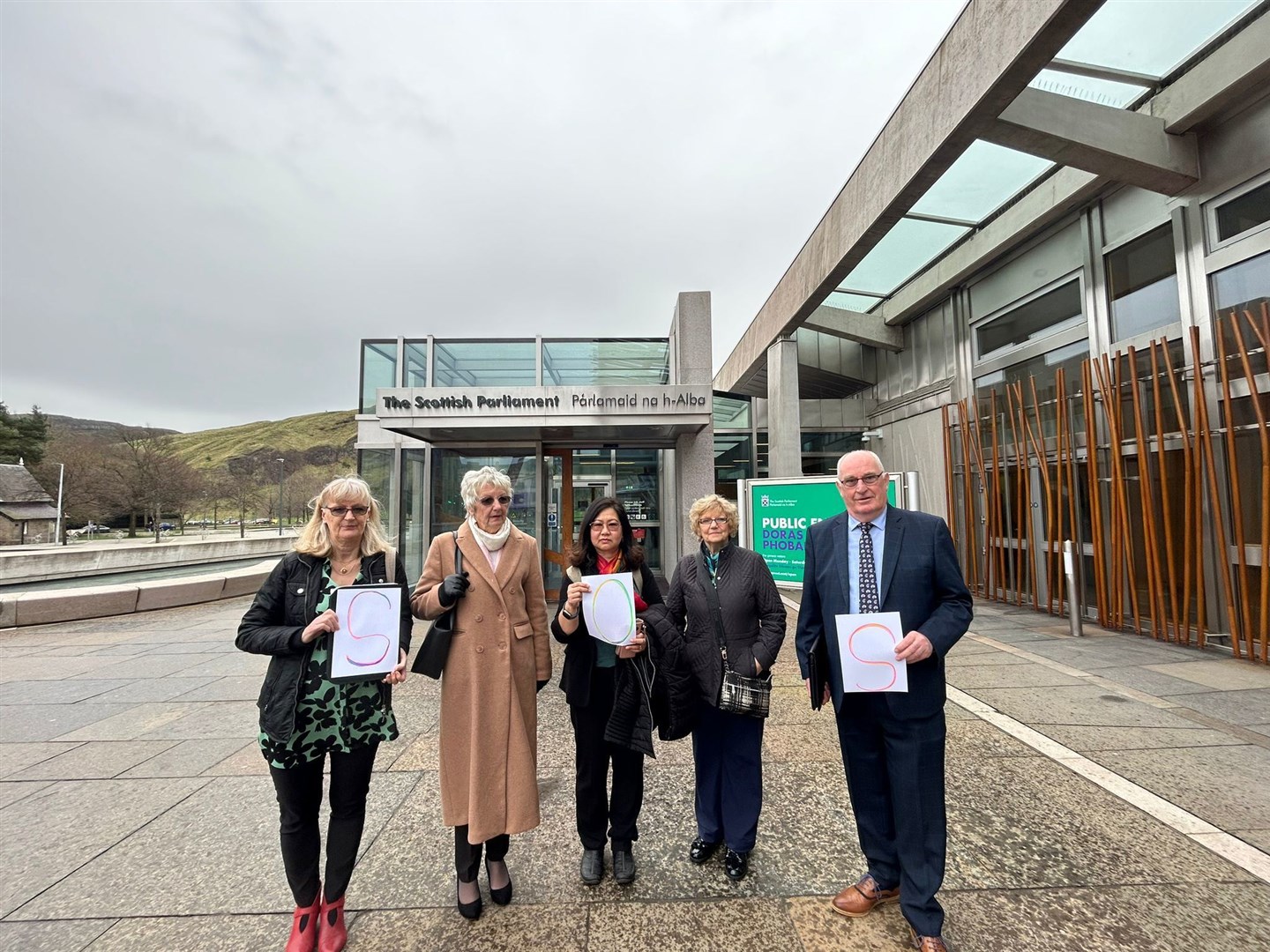 The five SOS group members outside the Scottish Parliament. Picture: Abbie Duncan