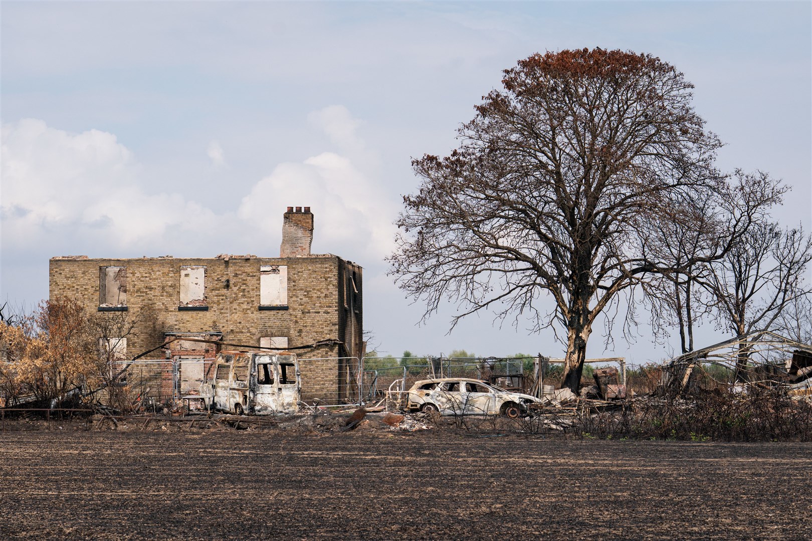A fire-damaged house in the village of Wennington after the summer heatwave (Dominic Lipinski/PA)