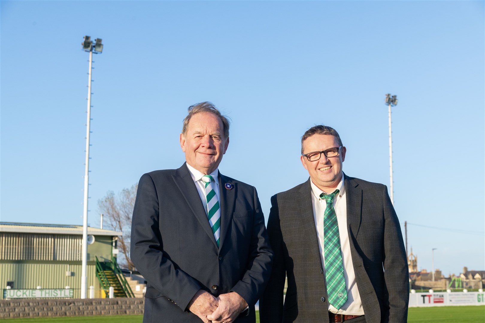 Let there be light! Buckie Thistle Vice President Raymond Cardno (left) and General Manager Stephen Shand celebrate the club's £26,750 award to help fund new LED floodlights. Picture: Beth Taylor