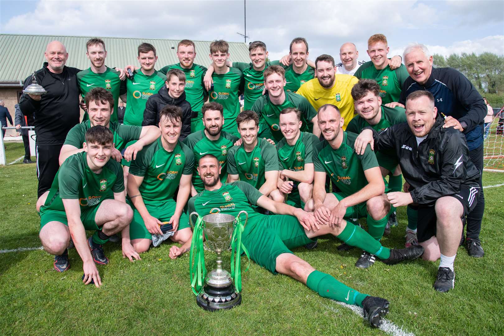 Dufftown celebrate their Elginshire Cup success...Dufftown FC (2) vs Forres Thistle FC (2) - Dufftown FC win 5-3 on penalties - Elginshire Cup Final held at Logie Park, Forres 14/05/2022...Picture: Daniel Forsyth..