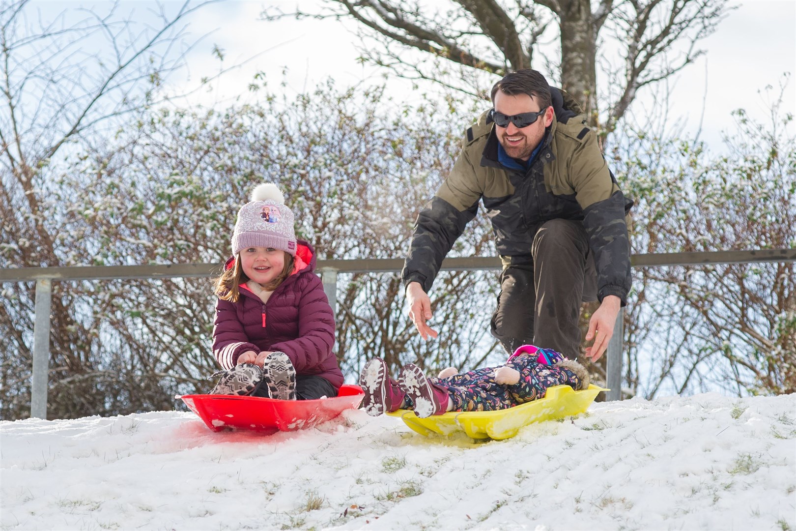Hollie and Emily MacPherson sledging at Cooper Park...Picture: Daniel Forsyth..
