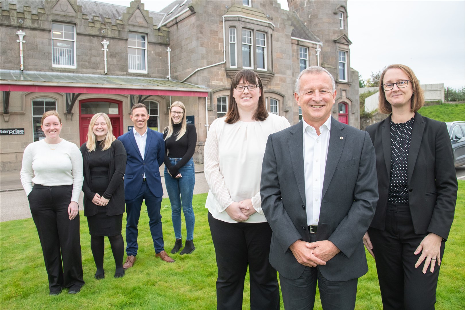 Ian Davidson (front), with the team at Harper McLeod in Elgin, from left, Erin Morrison (trainee solicitor), Lauryn McLean (paralegal), Will Davidson (solicitor), Eilidh Johnston (team assistant), Nicola Stephen (senior associate) Laura McLean (partner - family law). Picture: Daniel Forsyth