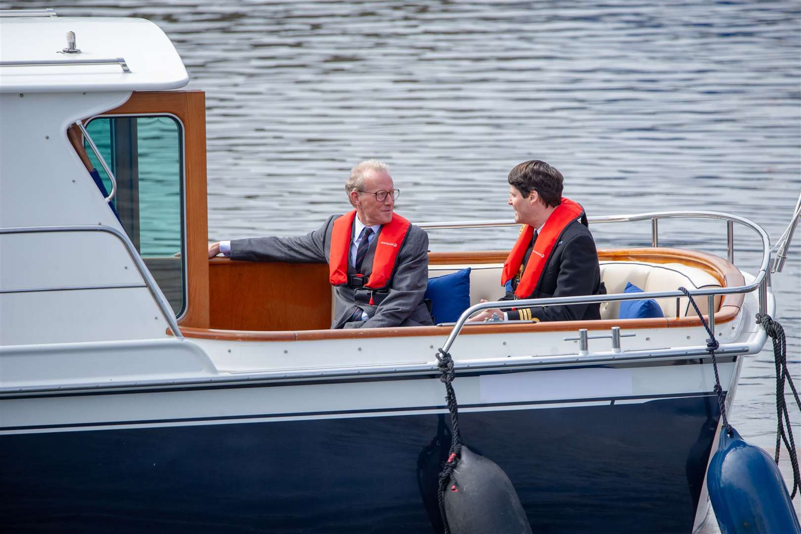 The Crown cast members aboard a boat at Macduff. Picture: Daniel Forsyth.