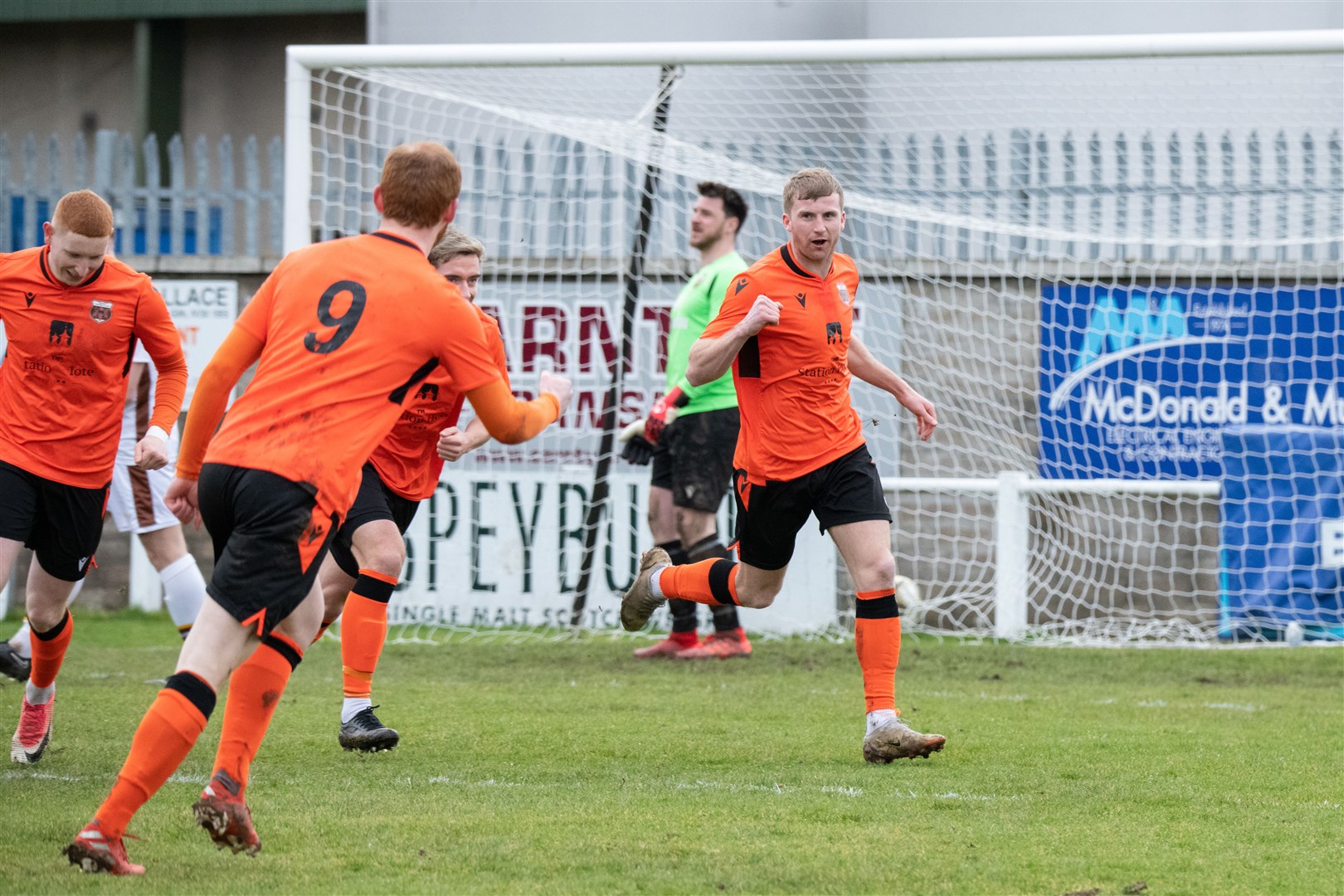 Aidan Sopel wheels away to celebrate his first goal for Rothes. Picture: Daniel Forsyth..