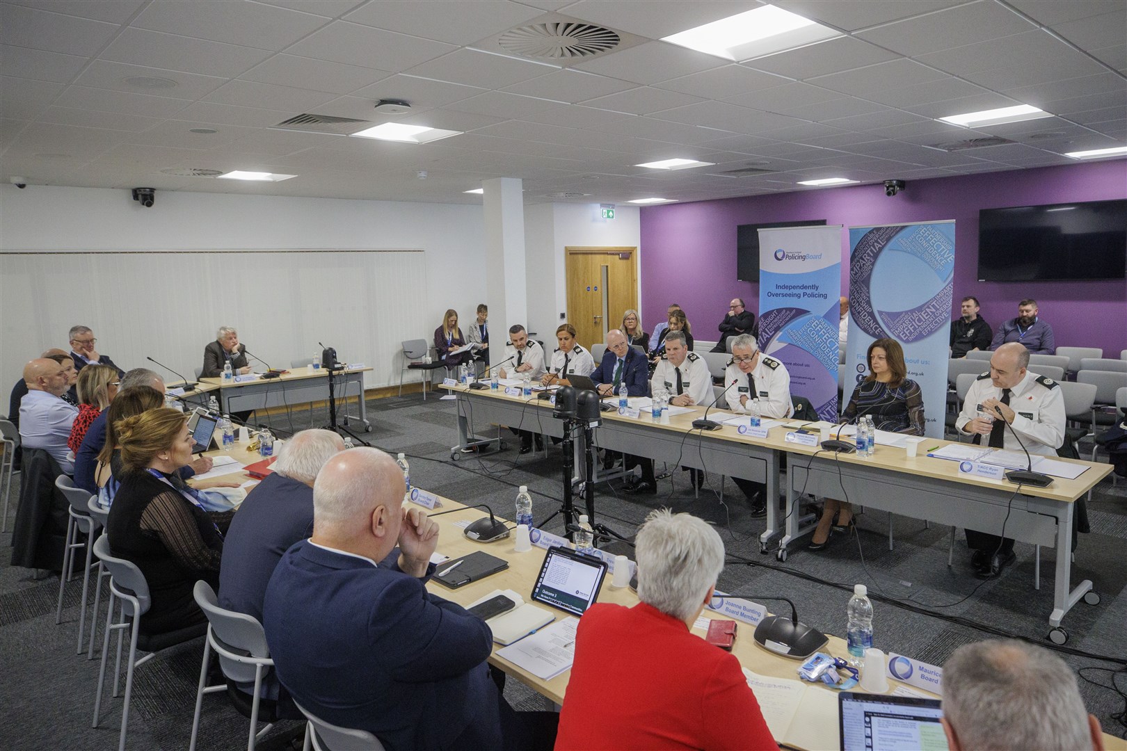 Interim PSNI Chief Constable Jon Boutcher (third right, facing) during a Northern Ireland Policing Board meeting in Belfast (Liam McBurney/PA)