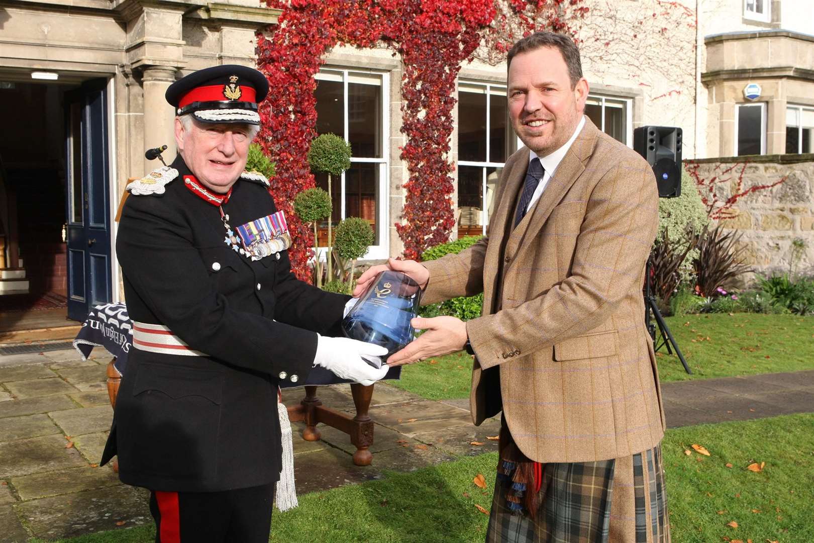 Johnstons of Elgin CEO, Simon Cotton, receives the Queen’s Award from Major General the Honourable Seymour Monro CBE LVO, Lord Lieutenant of Moray on behalf of Her Majesty The Queen.