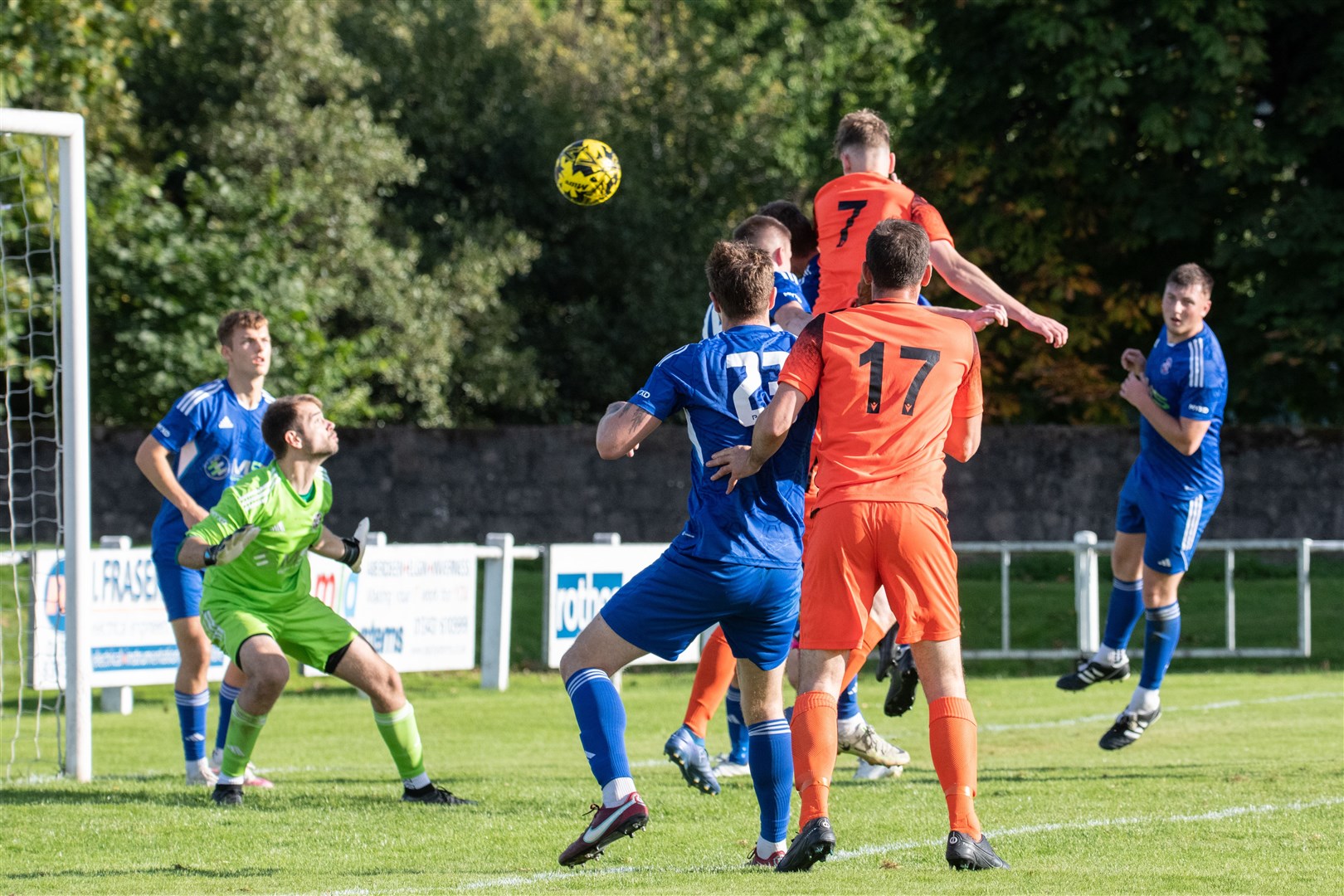 Rothes' Ben Johnstone #7 rises the highest to head home the only goal of the game. ..Rothes FC (1) vs Lossiemouth FC (0) - Highland Football League 23/24 - Mackessack Park, Rothes 16/09/2023...Picture: Daniel Forsyth..