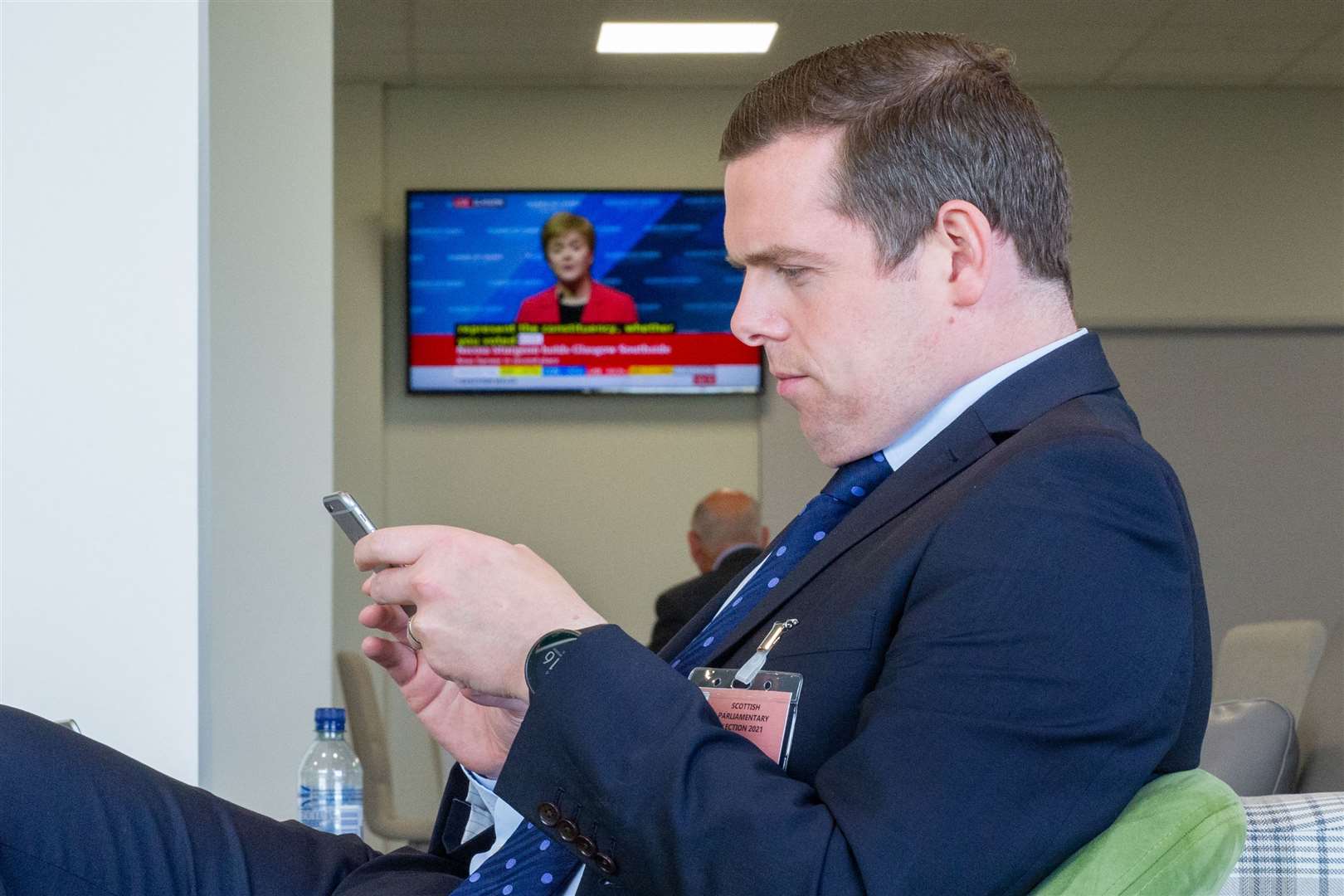 Moray MP and Scottish Tory leader Douglas Ross focusses on his mobil as Nicola Sturgeon is re-elected to the Scottish Parliment at the 2021 Scottish Election. Picture: Daniel Forsyth