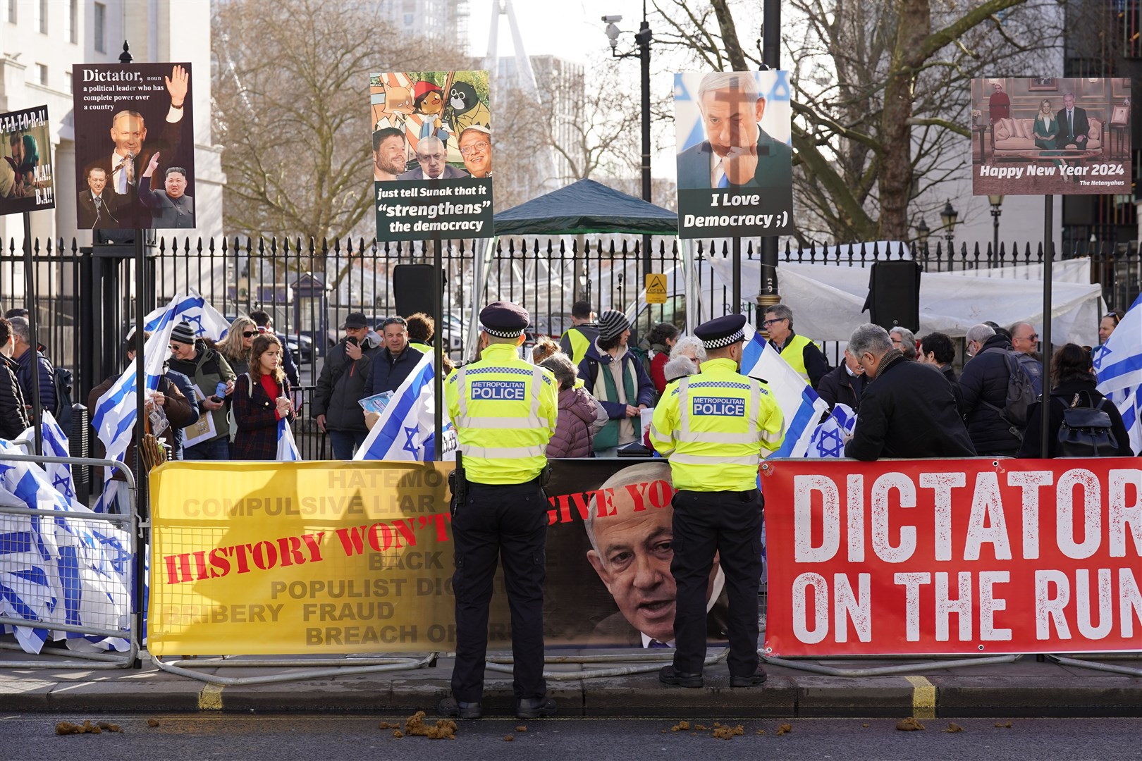 Demonstrators outside Downing Street (Stefan Rousseau/PA)