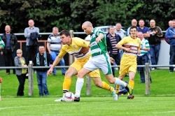 Steven Fraser (left), pictured in action for Forres Mechanics, has been placed on the transfer list by the Mosset Park club.